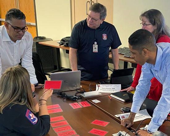 Emergency Telecommunication staff from around the region and country work on a project as part of their NENA Center Manager Certificate Program.
