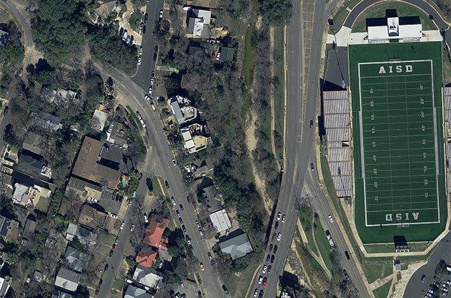 aerial map of streets, houses and football field
