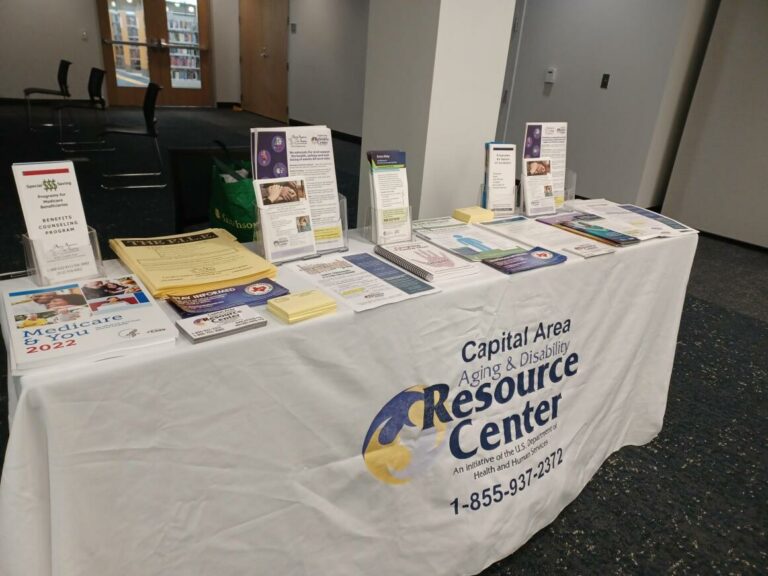 capital area aging and disability resource center vendor booth table with resources