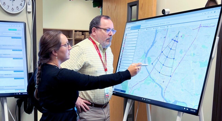 homeland security staff reviewing digital map